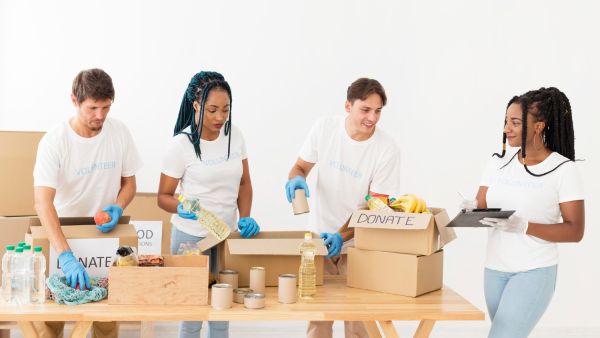What role do volunteers play in supporting vulnerable communities in the UK?